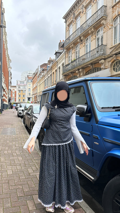 Haut asymétrique à pois blanc