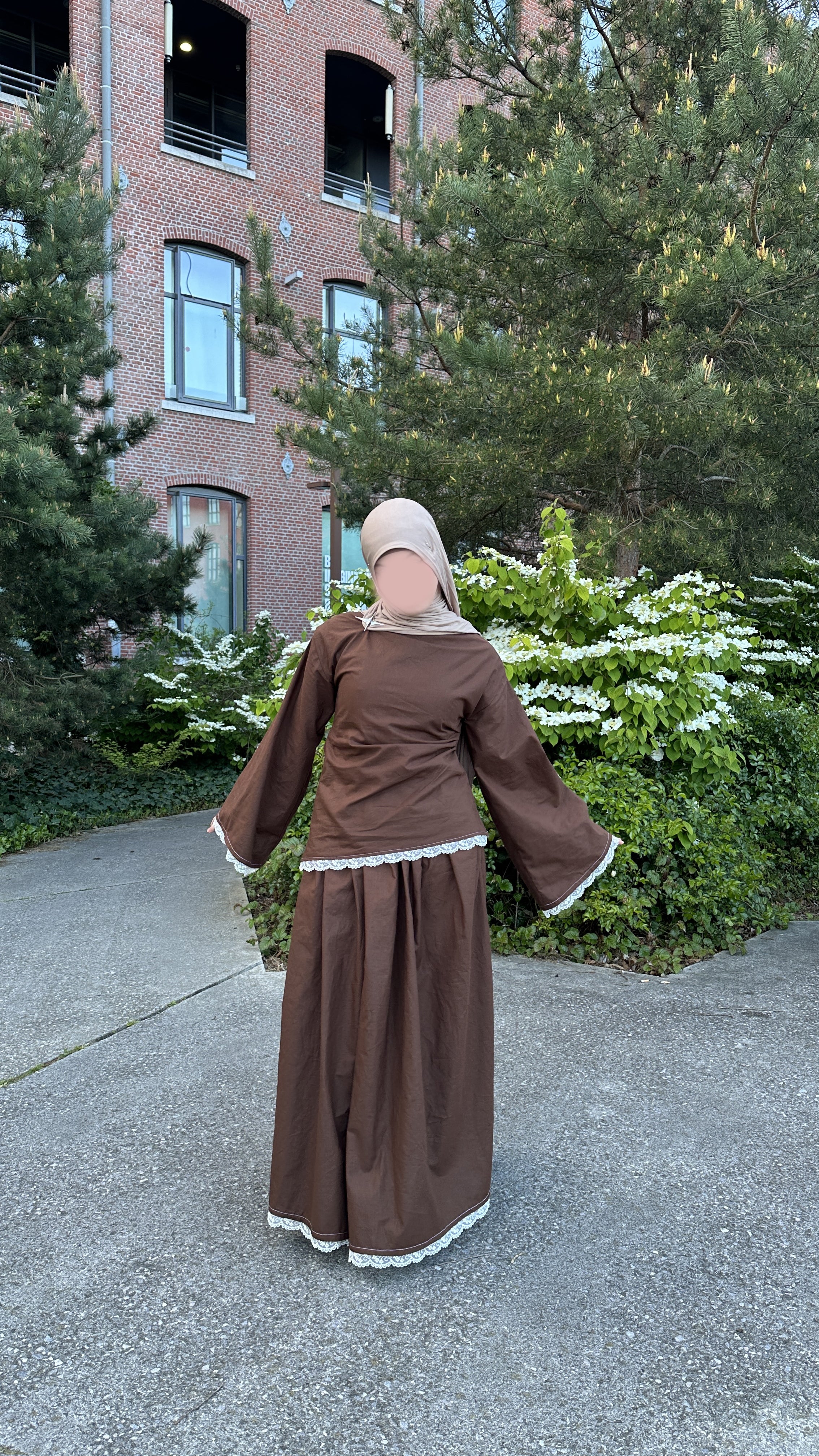 Solid brown asymmetrical top